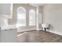 A bright laundry room featuring large windows, plenty of counter space and a utility sink at 360 Wembley Cir, Atlanta, GA 30328