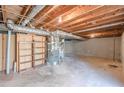 Spacious unfinished basement with an open ceiling offers potential for customization at 3344 Creekwood Dr, Rex, GA 30273