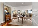 Elegant living room with hardwood floors, ample windows, and sophisticated decor at 750 Park Ne Ave # 25W, Atlanta, GA 30326