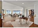 Bright and airy living room with hardwood floors, large windows, and ample seating at 750 Park Ne Ave # 25W, Atlanta, GA 30326