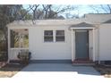 Inviting front entrance with a covered porch and freshly painted exterior at 2568 Loghaven Nw Dr, Atlanta, GA 30318