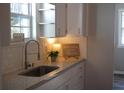 Beautiful kitchen featuring granite countertops, stainless steel faucet, and ample cabinet space at 2568 Loghaven Nw Dr, Atlanta, GA 30318