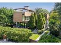 Aerial view of a modern home with meticulously manicured landscaping at 238 Olympic Pl, Decatur, GA 30030