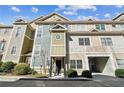 Inviting townhome with a unique facade and convenient covered parking at 556 Moreland Ne Ave # J, Atlanta, GA 30307