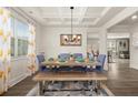 Inviting dining room featuring a stylish table, bench seating, and modern decor at 372 Garnet Dr, Acworth, GA 30101