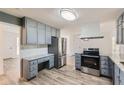 Well-designed kitchen featuring modern appliances, a sleek range hood, and generous counter space at 105 Glenn Burnie Dr, Stockbridge, GA 30281