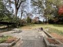 Private backyard patio and fireplace for relaxation and outdoor entertaining at 2020 Wilandrew Dr, Decatur, GA 30033