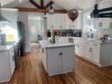 Well-lit kitchen boasts a large center island and modern stainless steel appliances at 1575 Montreat Pl Sw Pl, Atlanta, GA 30311