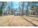 Charming home featuring a well-maintained yard, mature trees, and a classic facade at 3524 Exeter Ct, Snellville, GA 30039