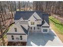 Lovely home featuring manicured lawn and ample parking space at 255 Olde Oak Dr, Jonesboro, GA 30238