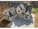 An aerial view showcasing the house's large driveway and garage at 255 Olde Oak Dr, Jonesboro, GA 30238