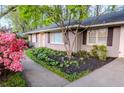 Charming home with manicured landscaping, colorful azaleas, and a well-maintained walkway for added curb appeal at 1263 Briarcliff Ne Rd, Atlanta, GA 30306