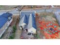 Aerial view of the home featuring the backyard area, fire pit and backyard deck at 5435 E Mountain St, Stone Mountain, GA 30083