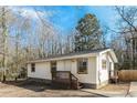 Attractive single-story home with well-maintained siding and a small front porch at 114 Howell Sw Dr, Atlanta, GA 30331