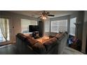 Comfortable living room with natural light, ceiling fan, and cozy furnishings at 637 Outlook Way, Atlanta, GA 30349