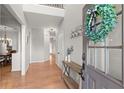 Welcoming foyer with hardwood floors and a view into the dining room at 2230 Rosemoore Walk, Marietta, GA 30062