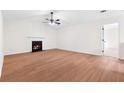Spacious living room features beautiful laminate flooring, fireplace, and lots of natural light at 2966 Knollberry Ln, Decatur, GA 30034