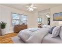 A neutral bedroom featuring a full-length mirror and light hardwood floors at 425 Lindbergh Ne Dr # A2, Atlanta, GA 30305
