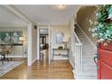 Open foyer with hardwood floors, a staircase, and an adjacent sitting room at 3542 Jefferson Township Pkwy, Marietta, GA 30066
