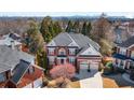 Beautiful two-story home with mature trees, a well-maintained lawn, and in a desirable neighborhood near the city at 4095 Oberon Se Ct, Smyrna, GA 30080