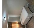 Bedroom featuring hardwood floors, a neutral color scheme, and bright, natural light at 6756 Brookwood Cir, Jonesboro, GA 30043