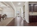 Elegant foyer featuring hardwood floors and view of the stairs at 1263 Polk Xing, Mcdonough, GA 30252