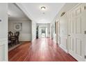 Spacious foyer with hardwood floors and elegant trim detail at 3004 Westray Nw Ct, Marietta, GA 30064