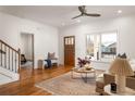 Bright and airy living room with hardwood floors, large windows, and comfortable seating at 624 3Rd Ave, Decatur, GA 30030