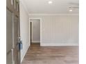 A recently renovated living room featuring lovely plank floors and light gray walls at 2260 Old Spring Se Rd, Smyrna, GA 30080