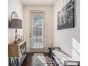 Bright hallway features a console table, bench, and artwork, creating a welcoming entrance at 3238 Spicy Cedar Ln, Lithonia, GA 30038