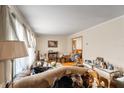 Bright living room with hardwood floors and large window with natural light at 2631 Miriam Ln, Decatur, GA 30032