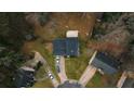 Bird's eye view of the house, with a deck in the back at 3981 Rocmar Dr, Snellville, GA 30039