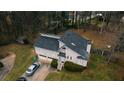 Attractive two-story home with a well-maintained lawn and driveway parking at 3981 Rocmar Dr, Snellville, GA 30039
