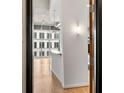Kitchen view through doorway, showcasing light and bright modern design at 943 Peachtree Ne St # 2009, Atlanta, GA 30309