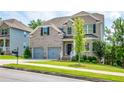 Charming two-story brick home with a two-car garage, and a nicely landscaped front yard at 3540 Lindsy Brook, Douglasville, GA 30135
