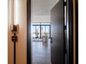 Inviting entrance to this apartment features suite number, opening to city views and elegant living space at 2425 Peachtree Nw Rd # 1802, Atlanta, GA 30305