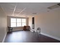 Open living room features great natural light, wood floors, and a neutral color palette at 4011 Florida Ave, Atlanta, GA 30360