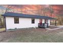Charming single story home with a front porch and mature trees at 4776 Ballew Dr, Powder Springs, GA 30127