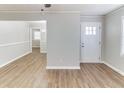 Inviting living room with hardwood floors and a view of the dining area at 2592 Miriam Ln, Decatur, GA 30032