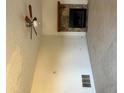 A bright living room features a stone fireplace and ceiling fan at 3626 Hopkins Ct, Powder Springs, GA 30127