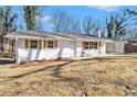 Charming, updated, white brick home featuring an inviting front entrance at 4326 Newton Cir, Douglasville, GA 30134