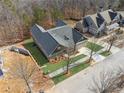 An aerial view of the home's manicured lawn and the neighborhood at 9089 Hanover St, Lithia Springs, GA 30122