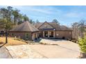 Beautiful brick home with attached garage, stone accents, and well-manicured front yard at 15 York Trce, Cartersville, GA 30121