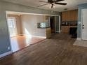 A cozy living room leading to an adjacent dining and kitchen area at 4749 Cox Se St, Acworth, GA 30101