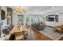 Inviting living room featuring hardwood floors, built-in shelving, and comfortable seating at 278 Midvale Ne Dr, Atlanta, GA 30342