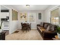 Cozy living room with neutral walls, an eat in area and comfortable furnishings at 2302 Abner Nw Pl, Atlanta, GA 30318