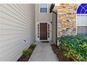 Welcoming front entrance with decorative stone accents and well-maintained landscaping at 6951 Foxmoor Way, Douglasville, GA 30134