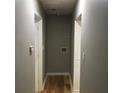 An efficient hallway with hardwood floors connects different areas within the home at 1140 Smith Sw St, Atlanta, GA 30310
