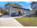 Beautiful one-story house with a large front yard and a newly installed driveway at 501 Harris Ave, Palmetto, GA 30268
