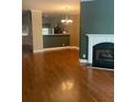 A cozy living room featuring a fireplace and hardwood flooring at 3094 Lauren Parc Rd, Decatur, GA 30032